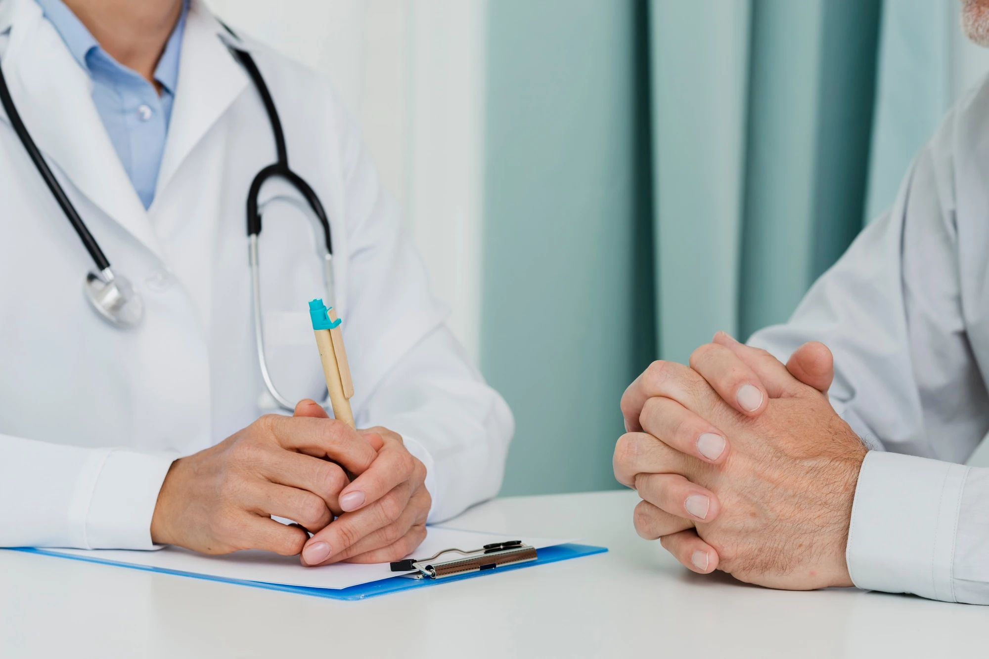 doctor-talking-with-patient-close-up_23-2148285762