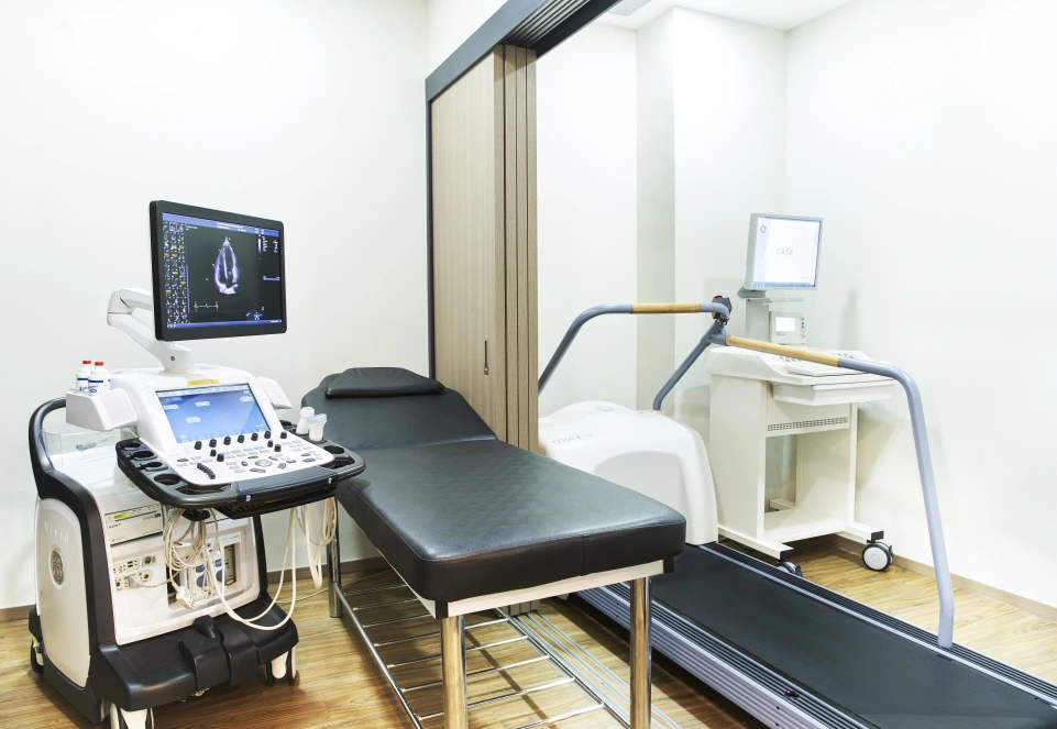 Cardiology clinic with echocardiography machine and exercise stress test treadmill